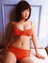 Steamy sultry gravure idol showing off her large juicey boobs
